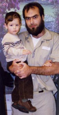  Masoud Ahmad Khan holding his son 2004 
